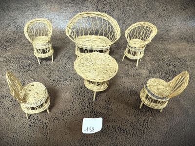 several wicker chairs and tables are arranged in a circle with a price tag