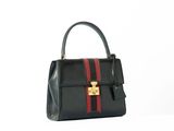 black leather handbag with red stripes and gold hardware