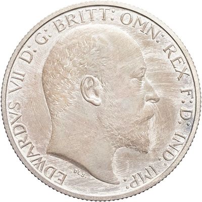a close up of a silver coin with a man ' s face on it