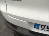 a close up of a car with a sticker on it ' s bumper