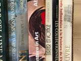 many books that are sitting on a shelf together
