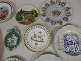 a lot of plates that are on the table