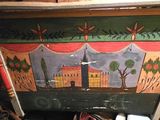une boîte en bois décorée d'une peinture