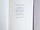 an open book with a picture of a cat on it