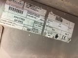 a label on the side of a refrigerator that says spc - t773
