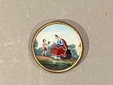 a picture of a picture of a man and a woman riding a horse