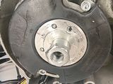 a close up of a motorcycle ' s front wheel and brake