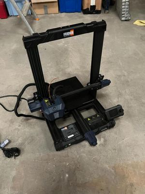 an image of a 3d printer in a garage