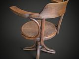 an image of a wooden chair with a cane on a black background