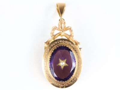 Pendentif broche ovale en or, formant un médaillon centré d'…