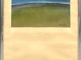 tableau représentant une scène de plage avec un ciel bleu et de l'herbe verte, dans un cadre argenté
