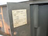 a metal box with a sign on it that says spare parts