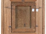 an old wooden picture frame with a number on it