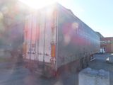 a semi truck that is parked in a parking lot