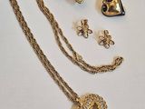 gold plated necklace and earring set with a heart shaped pendant