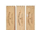 three wooden wine boxes with labels on them