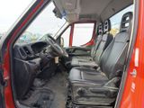 an image of a red truck with black leather seats