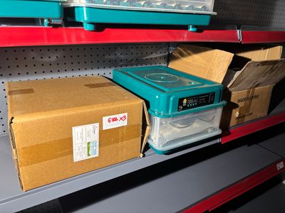 many boxes on the shelves in the store for sale