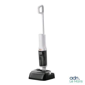 a close up of a black and white vacuum cleaner on a white background