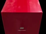 a close up of a red box on a black background