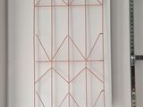 a picture of a wall hanging on the wall of a room