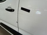 a close up of a car door with a sticker on it