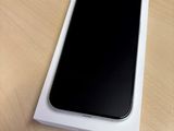 an iphone is sitting on top of a white box on a table