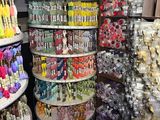 many different colors of nail polish on display in a store