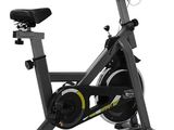 a close up of a stationary exercise bike on a white background