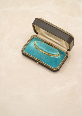 an image of a box with a ring inside of it on a table