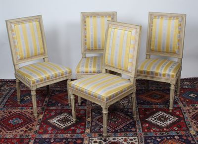 SUITE DE QUATRE CHAISES D'ÉPOQUE LOUIS XVI, à dossier droit.…