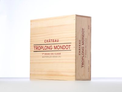 a wooden box with a logo on it that says trofong mondot