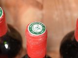 three bottles of wine that are sitting on a table