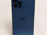 the back of a blue iphone with a camera attached to it