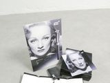 a notepad with a pen and a picture of marilyn monroe on it