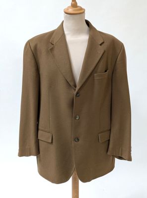an image of a suit on a mannequin stand