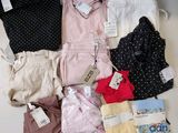 several pairs of underwear are laid out on a white table
