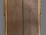 an image of a wooden plaque with a decorative design on it
