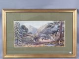 framed watercolor painting of a cabin in the mountains by a stream