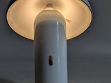 a light that is on in the middle of a table