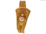 l'image d'une montre-bracelet de femme entourée d'une chaîne