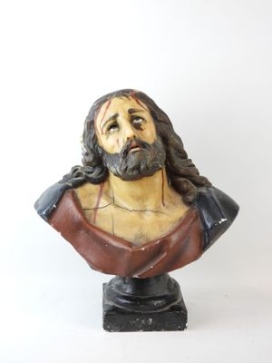 statue of jesus on a marble bust on a white background