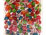 a close up of a bag of lollipops on a white background