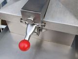an image of a machine with a red ball on it