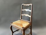an image of a chair with a wooden seat on a grey background