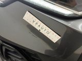 a sticker on the front bumper of a car