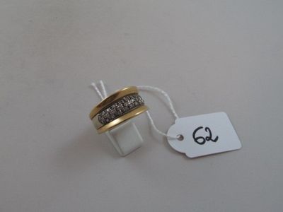 a ring that is on a string with a price tag