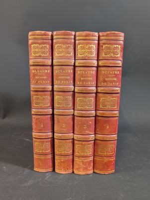 a set of five red books sitting on top of each other