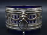 an image of a silver ring with a lion ' s head on it