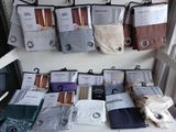 many different types of socks on display in a store